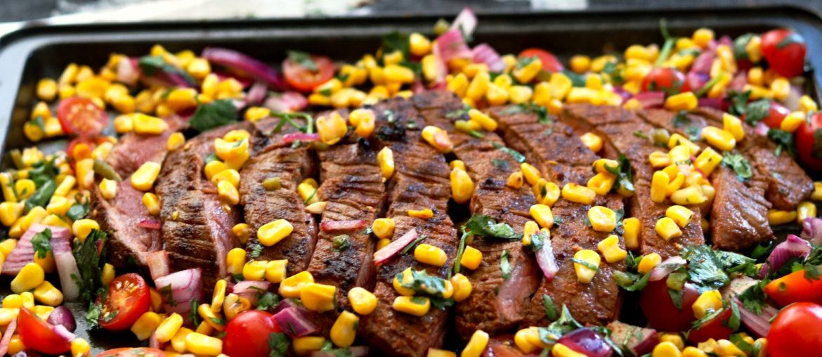 flank steak with corn salsa on top